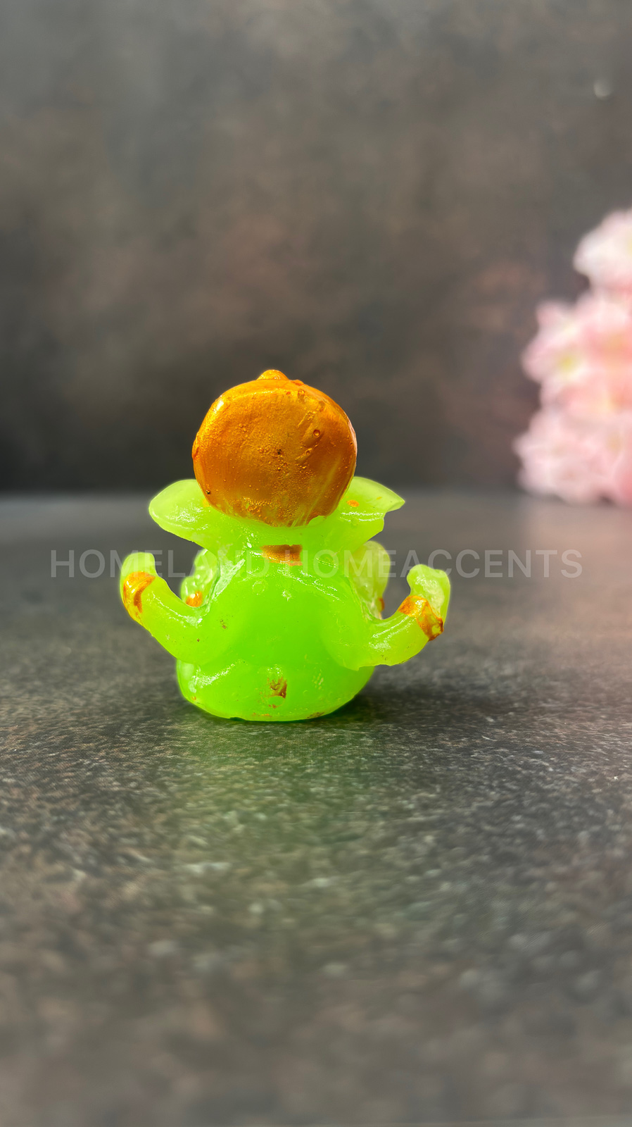 Bright Green Decorative Radium Resin Ganesha Idol