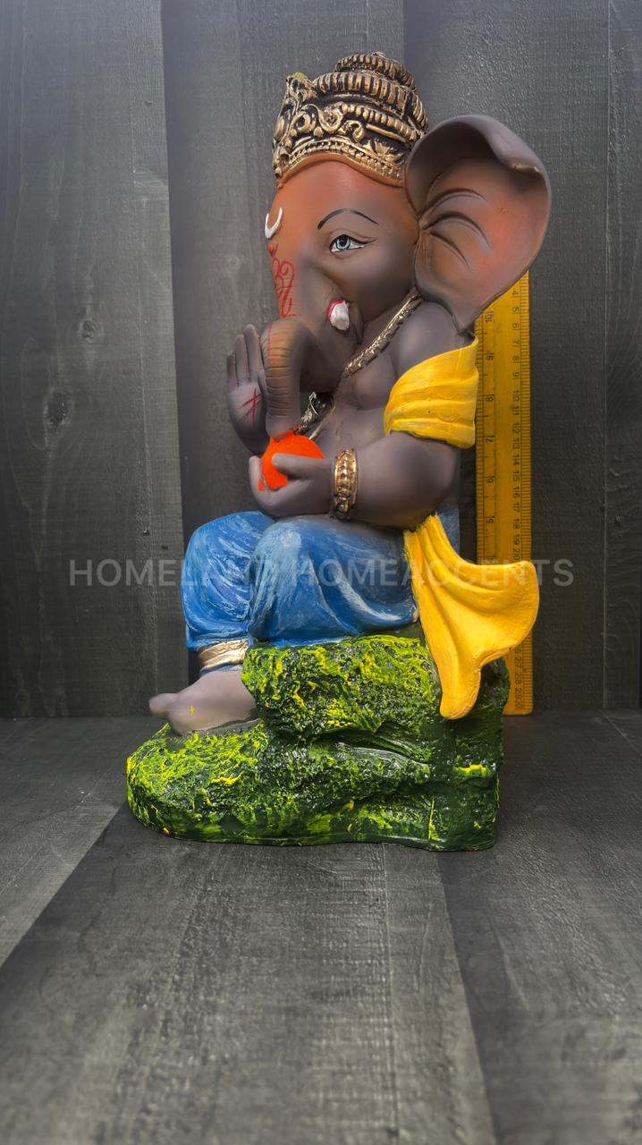 Laddu Ganesha Idol – Polyresin Decorative Showpiece