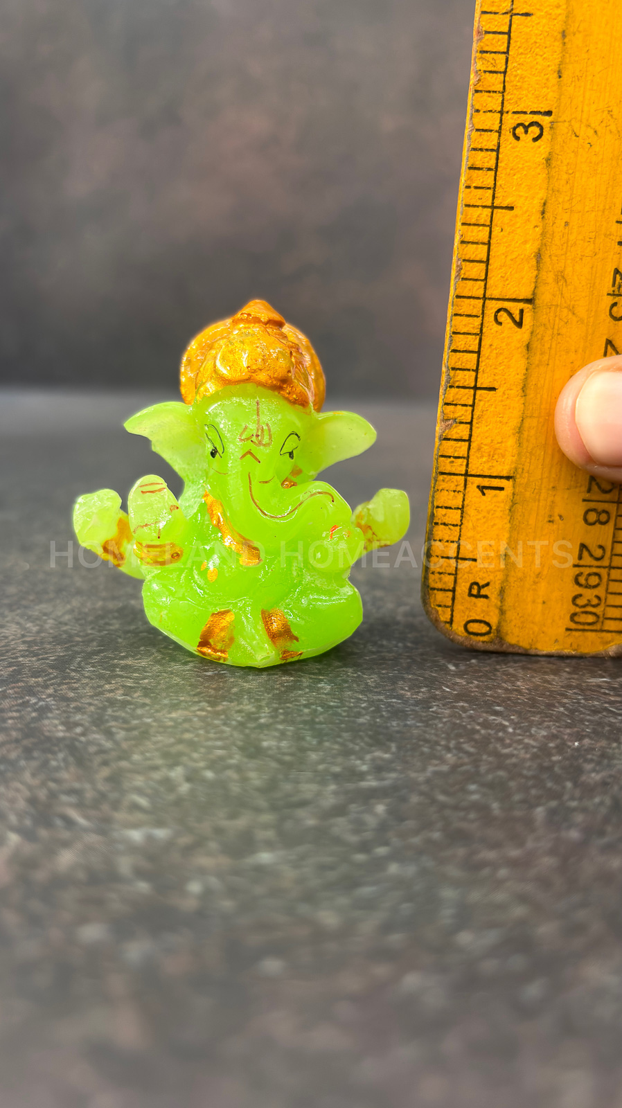 Bright Green Decorative Radium Resin Ganesha Idol