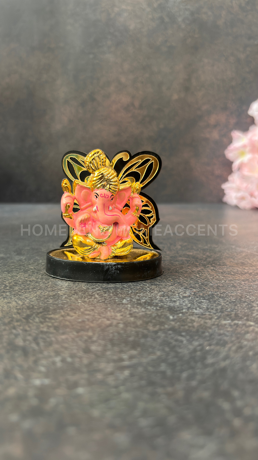 Pink Ganesh Idol with Gold-Tone Butterfly Design
