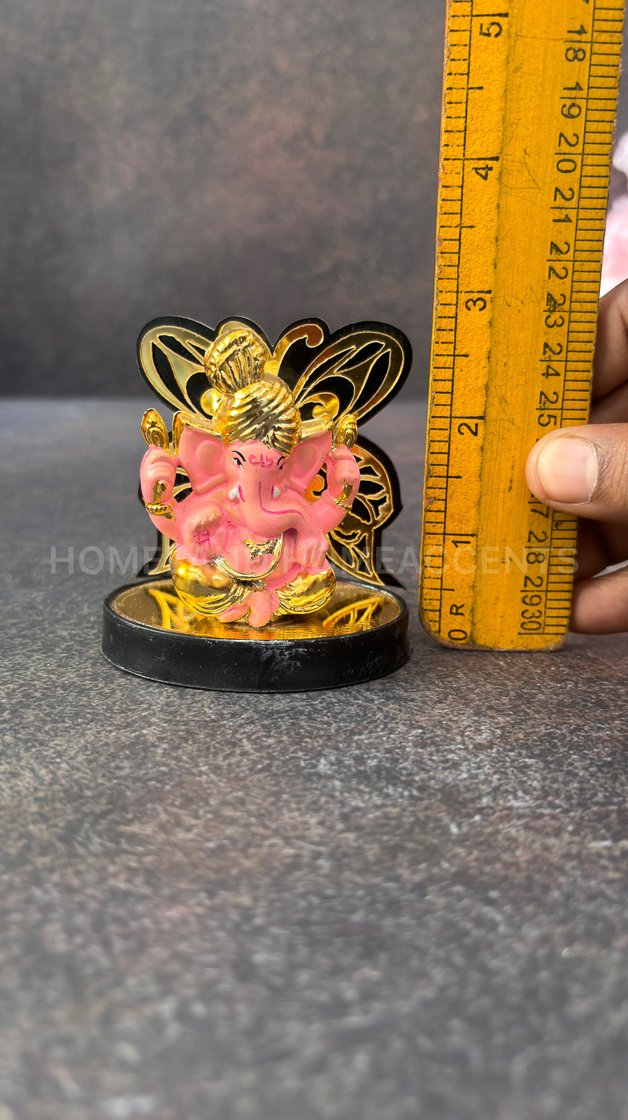 Pink Ganesh Idol with Gold-Tone Butterfly Design